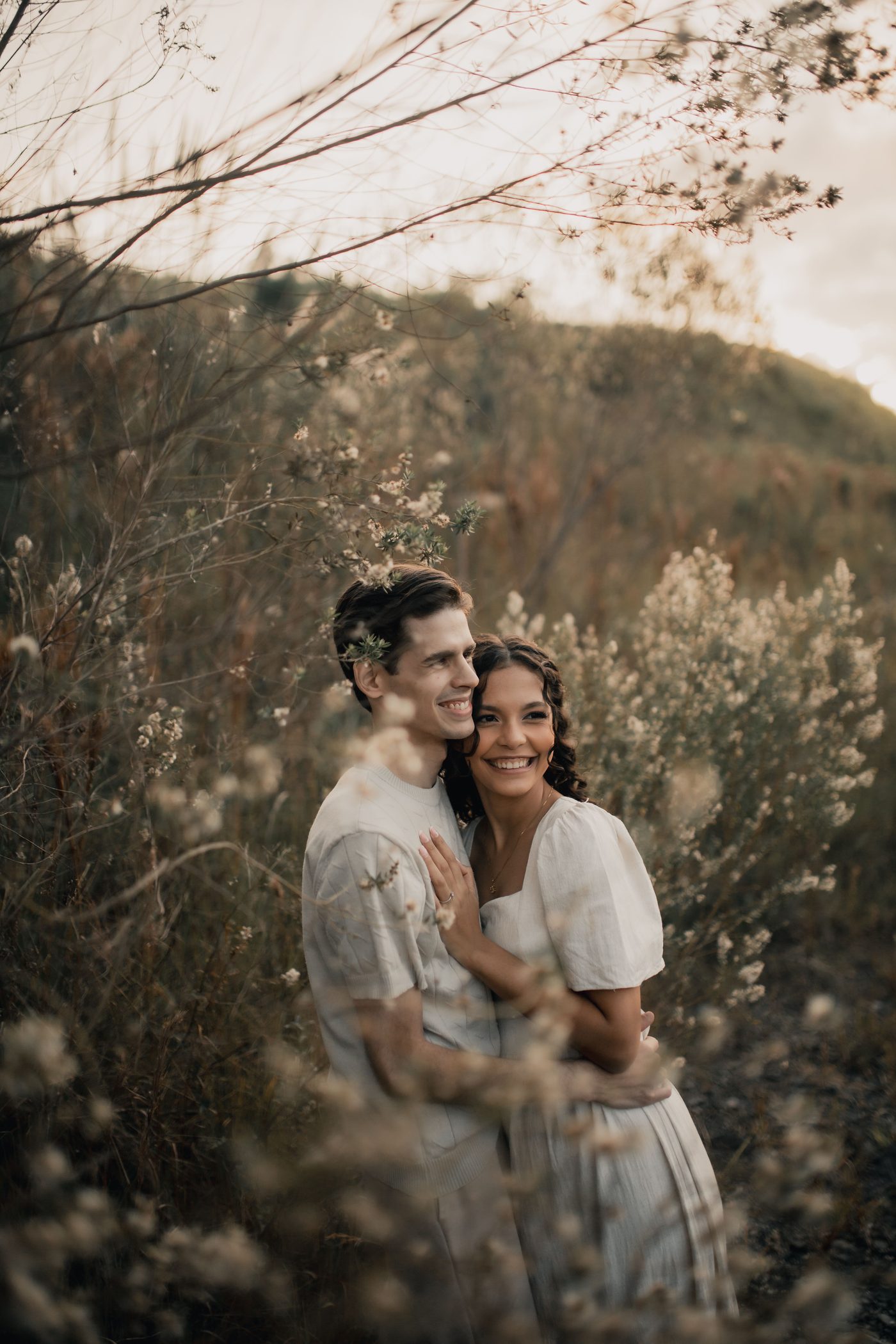Couple embracing outdoors